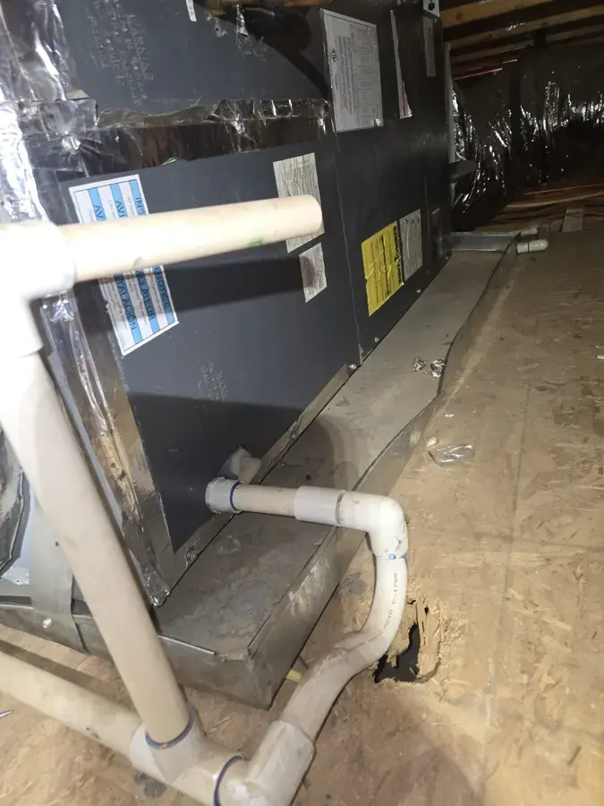 Air handler and PVC condensate drain line in a Plant City, FL attic
