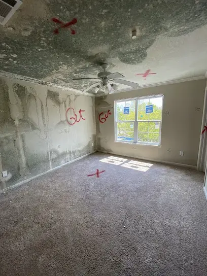 Ceiling marked for removal under a roof leak in a Plant City, FL bedroom